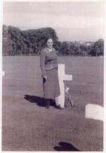 Herbert's older sister Ada Herring Arroya visits his grave site after the War